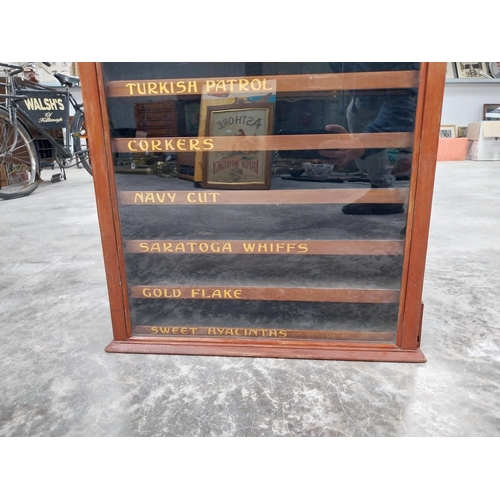 776 - Ogden's cigarettes dispensing advertising cabinet with seven pull out brand name drawers {H 77cm x W... 