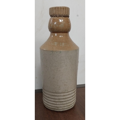 777 - A and R Thwaites and Co match strike {7 cm H x 8 cm Dia.} , Stoneware ginger beer bottle {18 cm H x ... 