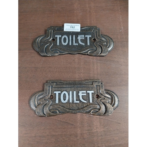 782 - Two Art Deco style Toilet door plaques. {8 cm H x 15 cm W}.