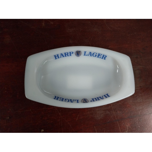 784 - Bass Wade ashtray {3 cm H x 16 cm W x 15 cm D} and Harp ashtray {3 cm H x 16 cm W x 9 cm D}.