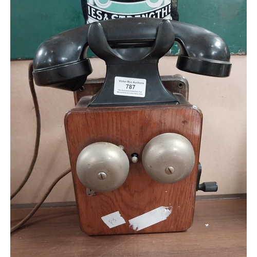 787 - 1940's Mahogany and Bakelite wall telephone. {28 cm H x 25 cm W x 13 cm D}.