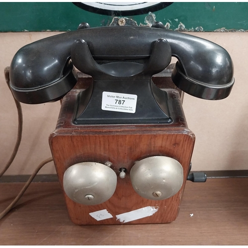 787 - 1940's Mahogany and Bakelite wall telephone. {28 cm H x 25 cm W x 13 cm D}.