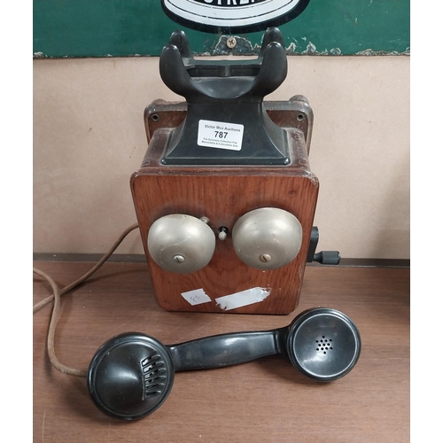 787 - 1940's Mahogany and Bakelite wall telephone. {28 cm H x 25 cm W x 13 cm D}.