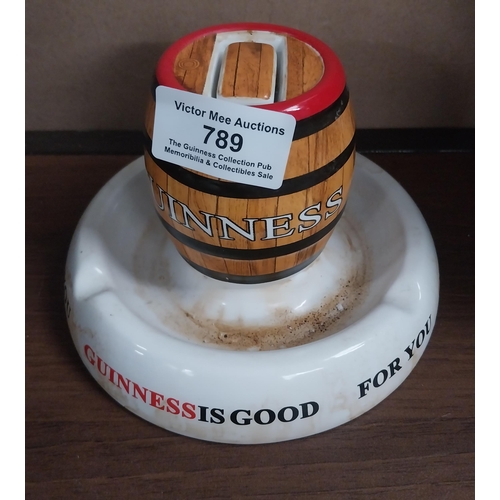 789 - Guinness ceramic match holder and strike. {10 cm H x 18 cm Dia.}