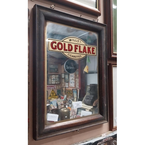 812 - Wills's Gold Flake framed advertising mirror. {41 cm H x 31 cm W}.