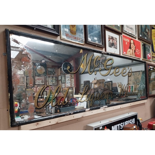 813 - Rare early 1900's McGee's Old Liqueur Whiskey framed advertising mirror. {68 cm H x 226 cm W}.