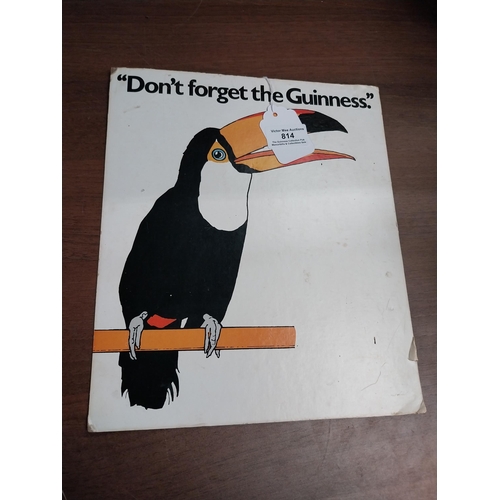 814 - Don't Forget the Guinness cardboard showcard. {29 cm H x 25 cm W}.