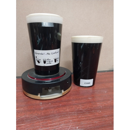 828 - Two Guinness fonts. {18 cm H x 13 cm Dia.} and {14 cm H x 8 cm Dia.}. PART OF THE DAVID HUGHES COLLE... 