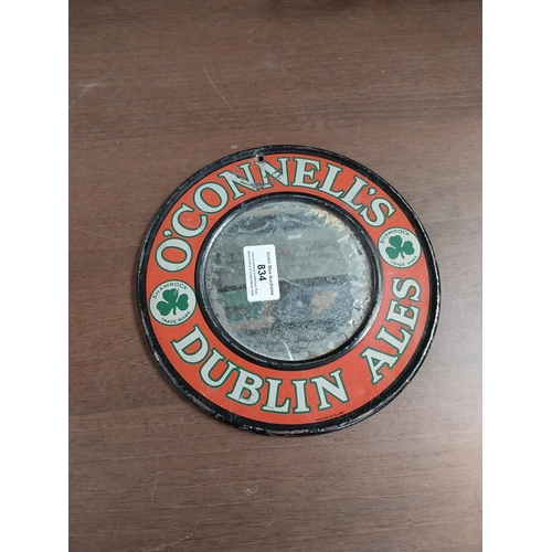 834 - O'Connell's Dublin Ales tinplate advertising mirror. {20 cm Dia.}.