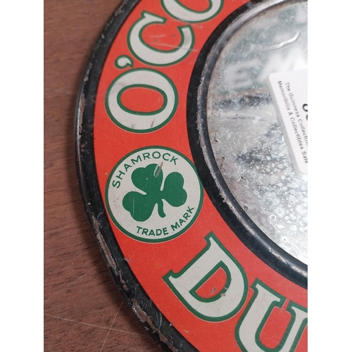 834 - O'Connell's Dublin Ales tinplate advertising mirror. {20 cm Dia.}.