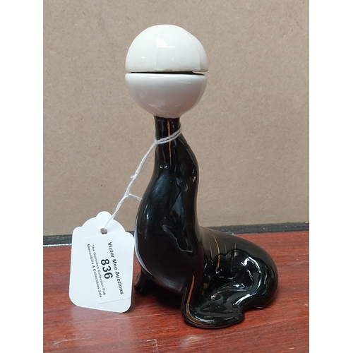 836 - Guinness ceramic seal in the form of a bottle {14 cm H x 9 cm W x 7 cm D} and Kangaroo {10 cm H x 9 ... 