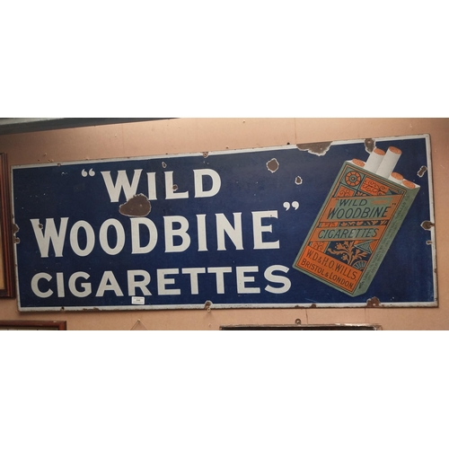 846 - Wild Woodbine Cigarettes enamel advertising sign. {48 cm H x 118 cm W}.