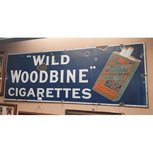 846 - Wild Woodbine Cigarettes enamel advertising sign. {48 cm H x 118 cm W}.