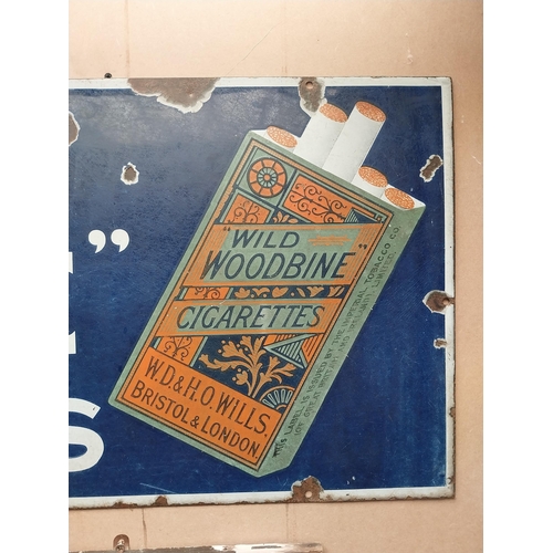 846 - Wild Woodbine Cigarettes enamel advertising sign. {48 cm H x 118 cm W}.