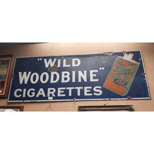 846 - Wild Woodbine Cigarettes enamel advertising sign. {48 cm H x 118 cm W}.