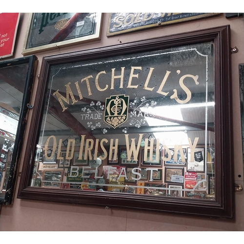 856 - Mitchell's Old Irish Whisky Belfast framed advertising mirror. {65 cm H x 80 cm W}.