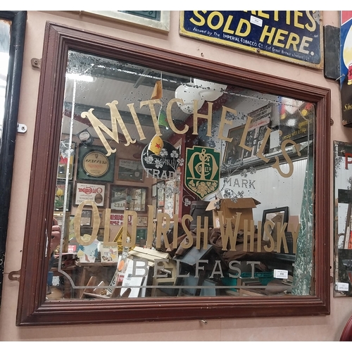 856 - Mitchell's Old Irish Whisky Belfast framed advertising mirror. {65 cm H x 80 cm W}.