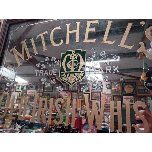 856 - Mitchell's Old Irish Whisky Belfast framed advertising mirror. {65 cm H x 80 cm W}.