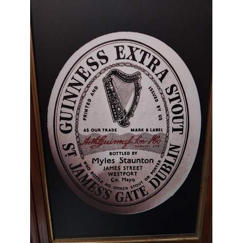 86 - Framed Guinness print. {37 cm H x 27 cm W}.