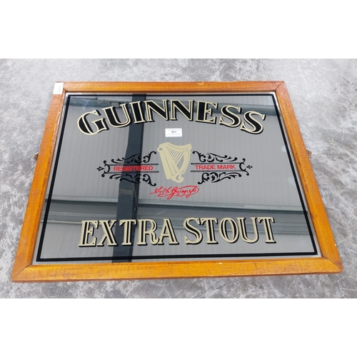 861 - Guinness Extra Stout framed advertising mirror. {48 cm H x 58 cm W].