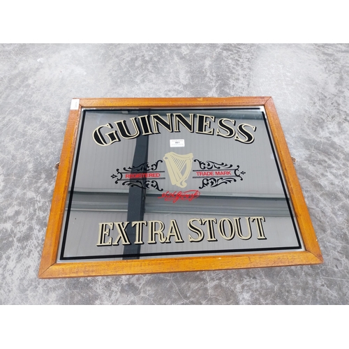 861 - Guinness Extra Stout framed advertising mirror. {48 cm H x 58 cm W].