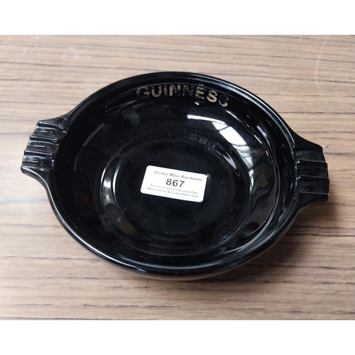 867 - Two glass Guinness ashtrays {4 cm H x 17 cm Dia.} approx.