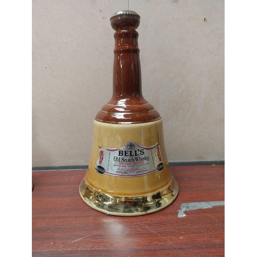 871 - Three ceramic graduated Bell's Old Scotch Whiskey advertising bells. {25 cm H x 15 cm Dia to 16 cm H... 