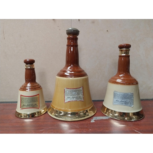 871 - Three ceramic graduated Bell's Old Scotch Whiskey advertising bells. {25 cm H x 15 cm Dia to 16 cm H... 