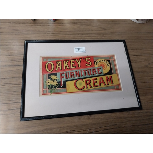 877 - Oakey's Furniture Cream framed showcard. {25 cm H x 35 cm W}.