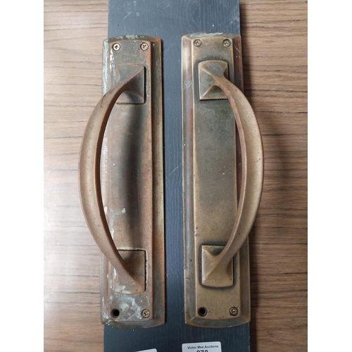 878 - Two Victorian brass door handles. {30 cm H  x 6 cm W}.