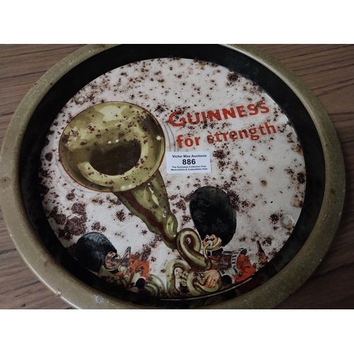 886 - Guinness for Strength tinplate drinks tray {34 cm Dia.} and another pictorial drinks tray. {27 cm Di... 