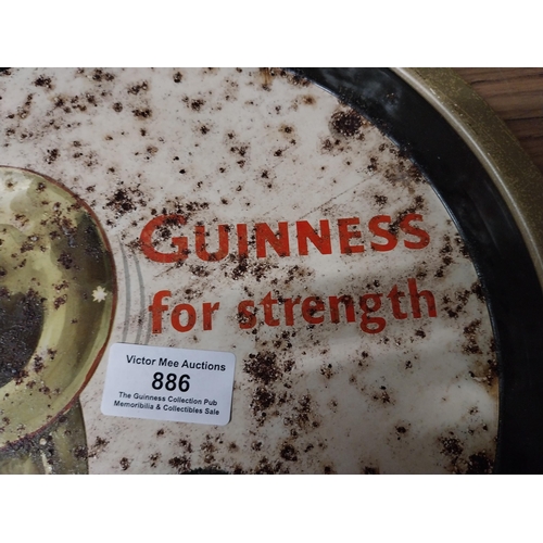 886 - Guinness for Strength tinplate drinks tray {34 cm Dia.} and another pictorial drinks tray. {27 cm Di... 