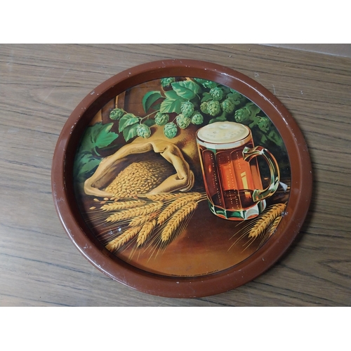 886 - Guinness for Strength tinplate drinks tray {34 cm Dia.} and another pictorial drinks tray. {27 cm Di... 