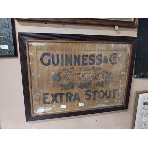 887 - Guinness on Draught Extra Stout framed advertising showcard. {55 cm H x 76 cm W}.