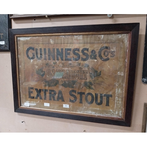 887 - Guinness on Draught Extra Stout framed advertising showcard. {55 cm H x 76 cm W}.