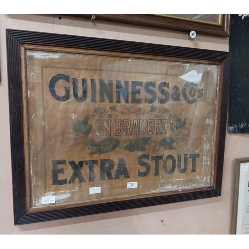 887 - Guinness on Draught Extra Stout framed advertising showcard. {55 cm H x 76 cm W}.