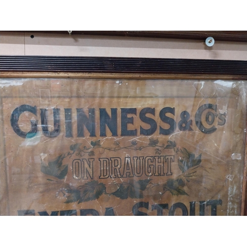 887 - Guinness on Draught Extra Stout framed advertising showcard. {55 cm H x 76 cm W}.