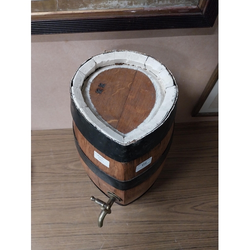 910 - Oak metal bound barrel with tap {43 cm H x 25 cm W}