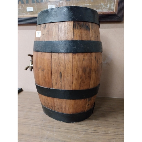 910 - Oak metal bound barrel with tap {43 cm H x 25 cm W}