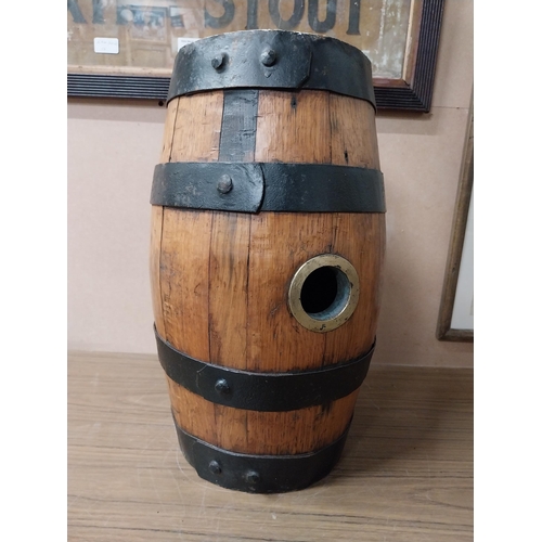 910 - Oak metal bound barrel with tap {43 cm H x 25 cm W}