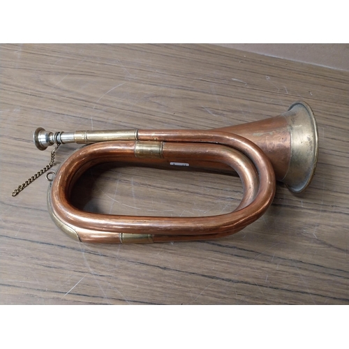 911 - Copper and Brass Bugle. {29 cm H x 13 cm Dia.}.