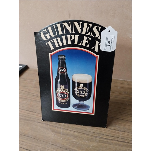 912 - Guinness Triple X advertising showcard. {31 cm H x 21 cm W}. PART OF THE DAVID HUGHES COLLECTION.