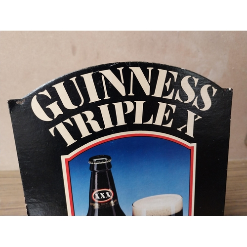 912 - Guinness Triple X advertising showcard. {31 cm H x 21 cm W}. PART OF THE DAVID HUGHES COLLECTION.