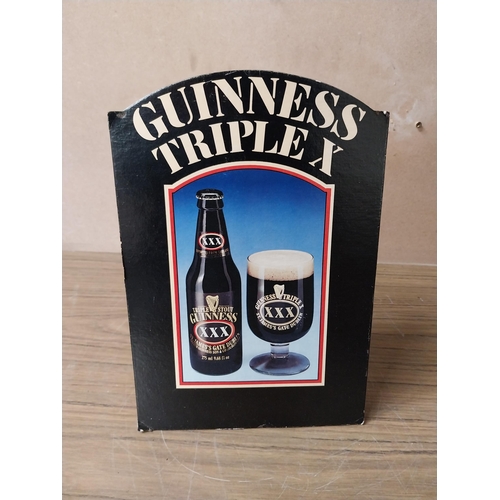 912 - Guinness Triple X advertising showcard. {31 cm H x 21 cm W}. PART OF THE DAVID HUGHES COLLECTION.