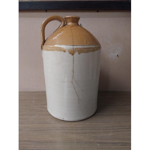 918 - Three 19th C. stoneware flagons.{36 cm H x 22 cm Dia.}, {22 cm H x 19 cm Dia.} and {24 cm H x 16 cm ... 