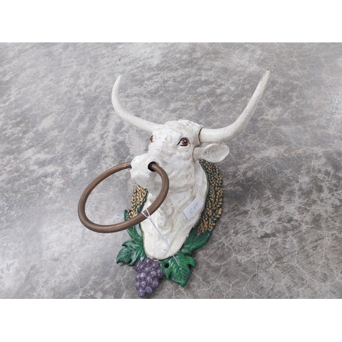 927 - Cast iron tie in form of Bulls Head. {16 cm H x 26 cm W x 27 cm D}.