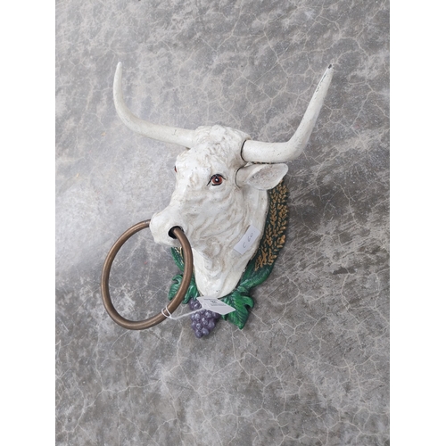 927 - Cast iron tie in form of Bulls Head. {16 cm H x 26 cm W x 27 cm D}.