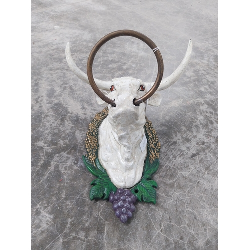 927 - Cast iron tie in form of Bulls Head. {16 cm H x 26 cm W x 27 cm D}.