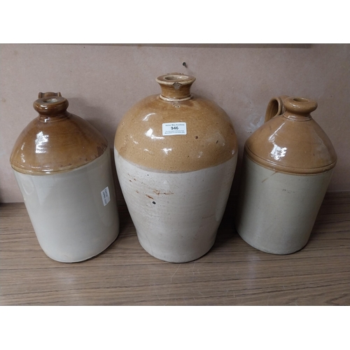 946 - Three 19th C. stoneware flagons. {40 cm H x 29 cm Dia. } and {33 cm H x 19 cm Dia}.