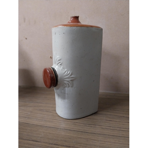 947 - Two 19th C. stoneware flagons {25 cm H x 15 cm Dia} and {25 cm H x 14 cm Dia.} and stone hot water b... 